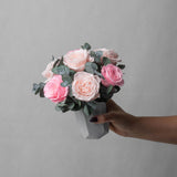 PRESERVED PINK ROSE ARRANGEMENT IN MARBLE VASE