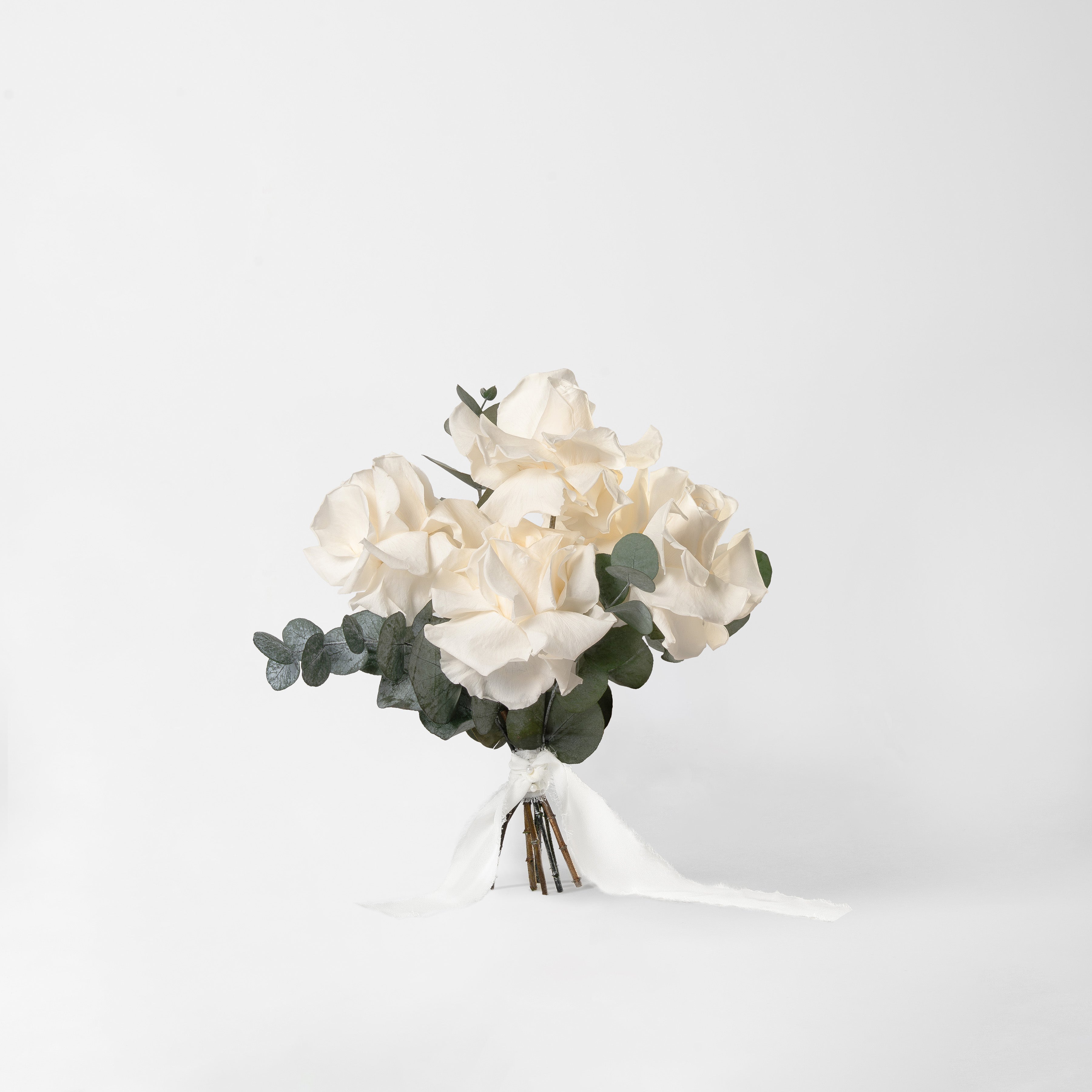 WHITE PRESERVED REFLEXED ROSE BRIDESMAID BOUQUET