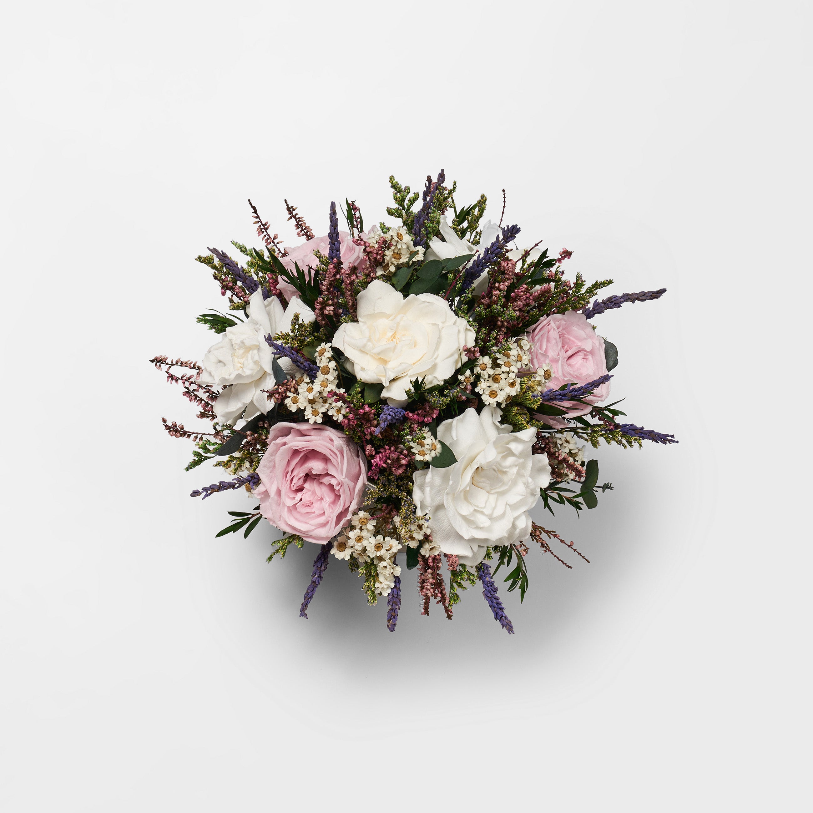 PRESERVED WHITE AND LILAC MIXED FLOWER ARRANGEMENT IN SILVER VASE