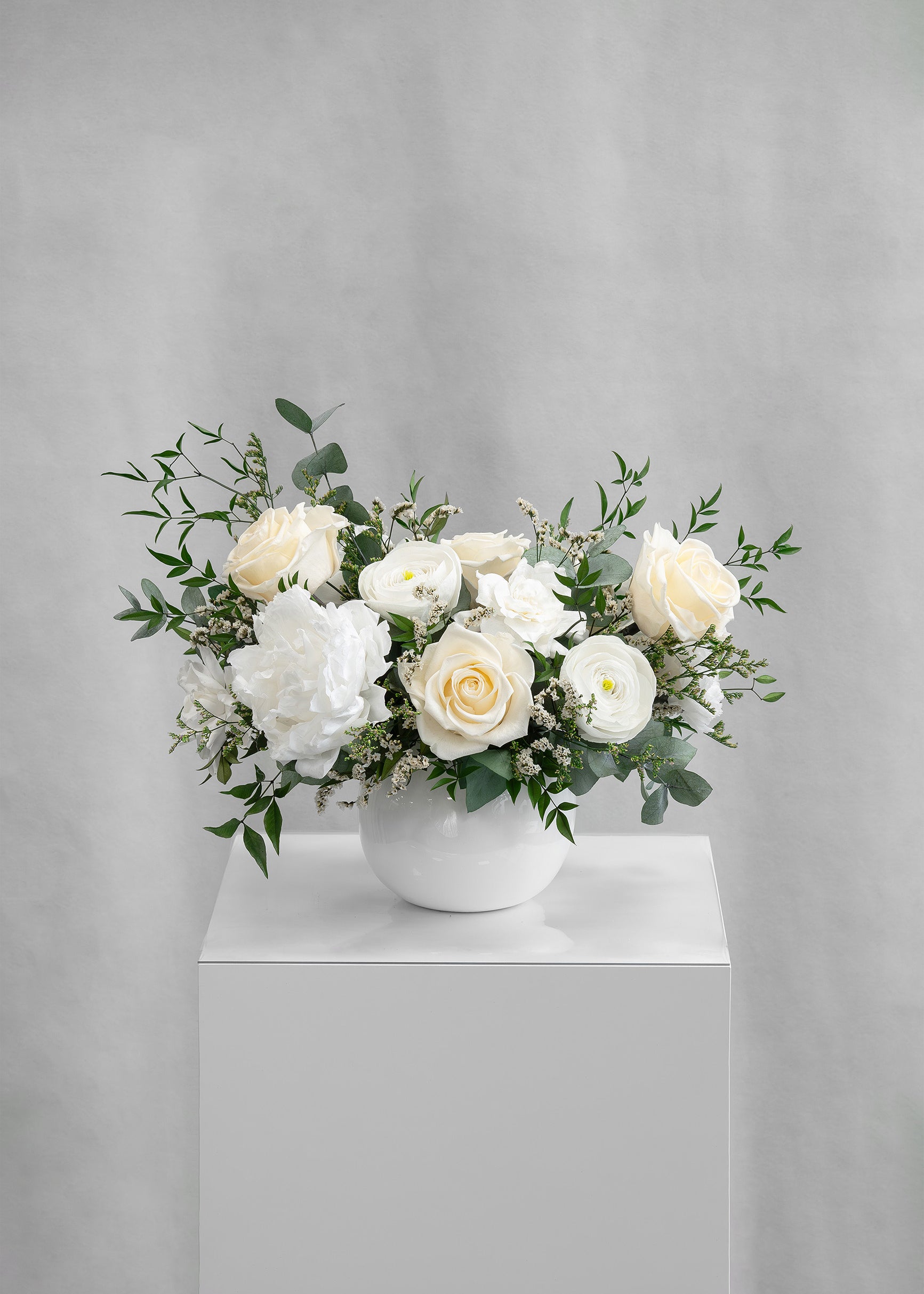 DENISE
PRESERVED WHITE MIXED FLOWER ARRANGEMENT IN YOUR CHOICE OF VASE
