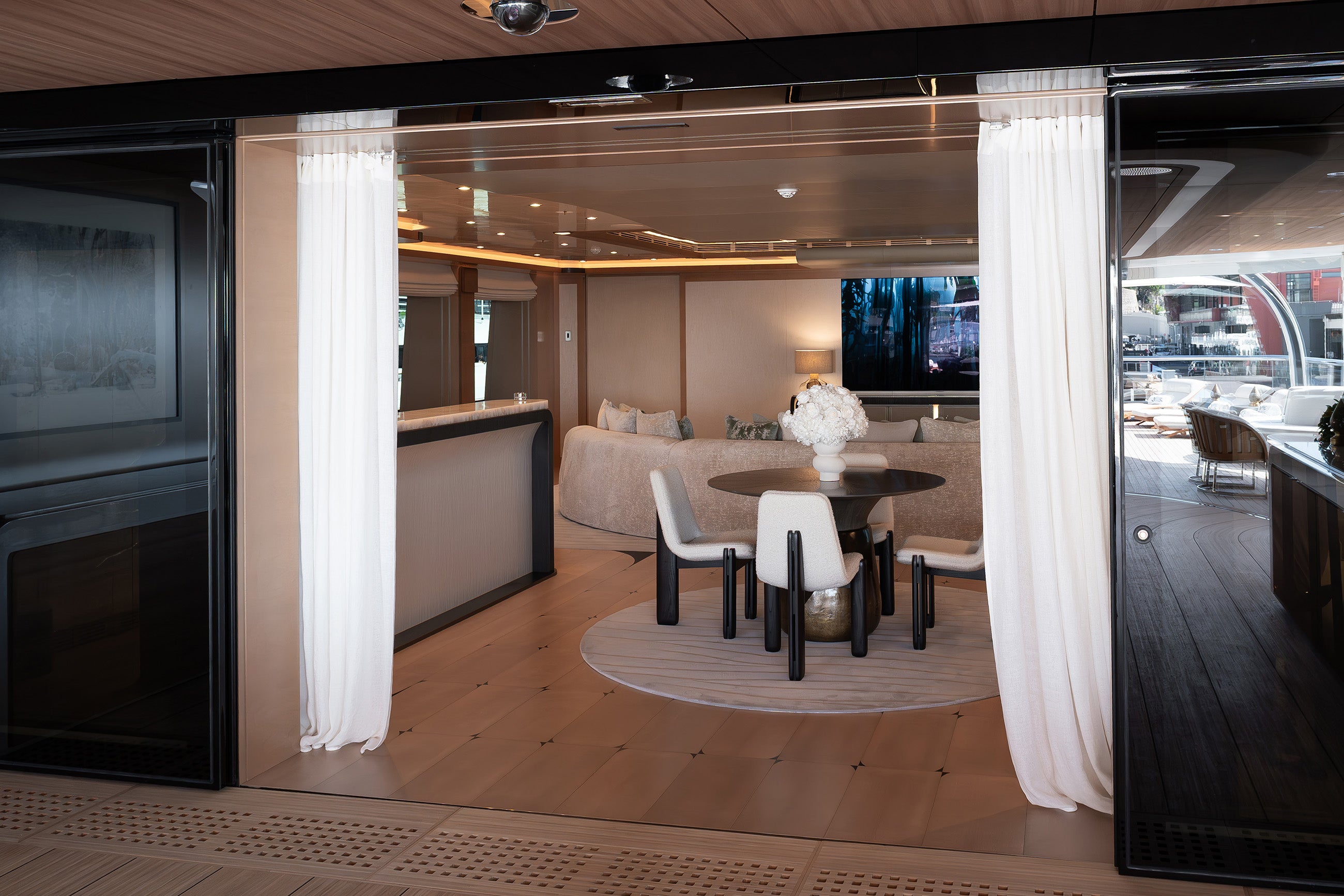 Preserved white hydrangea and roses arrangement in the main salon of a yacht