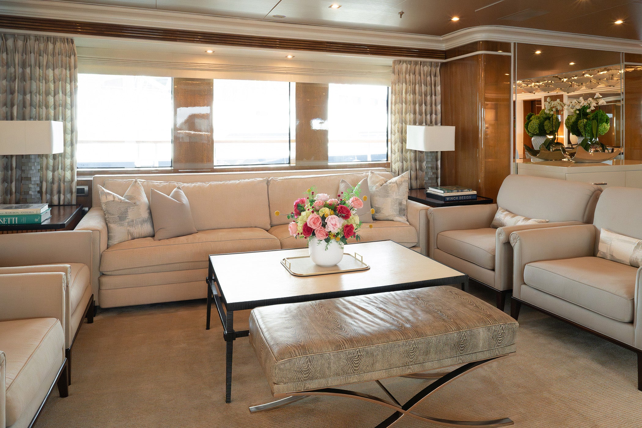 Long lasting preserved arrangement with preserved roses, peonies and hydrangeas in a vase on board a yacht