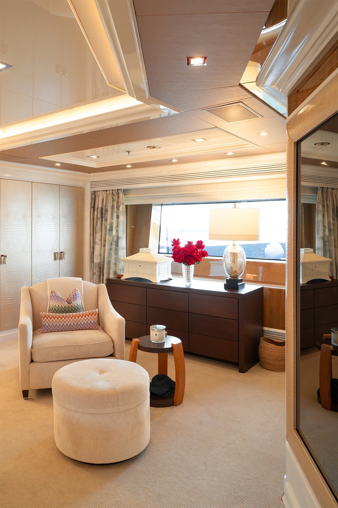 Long lasting preserved reflexed roses arrangement in a vase on board a yacht
