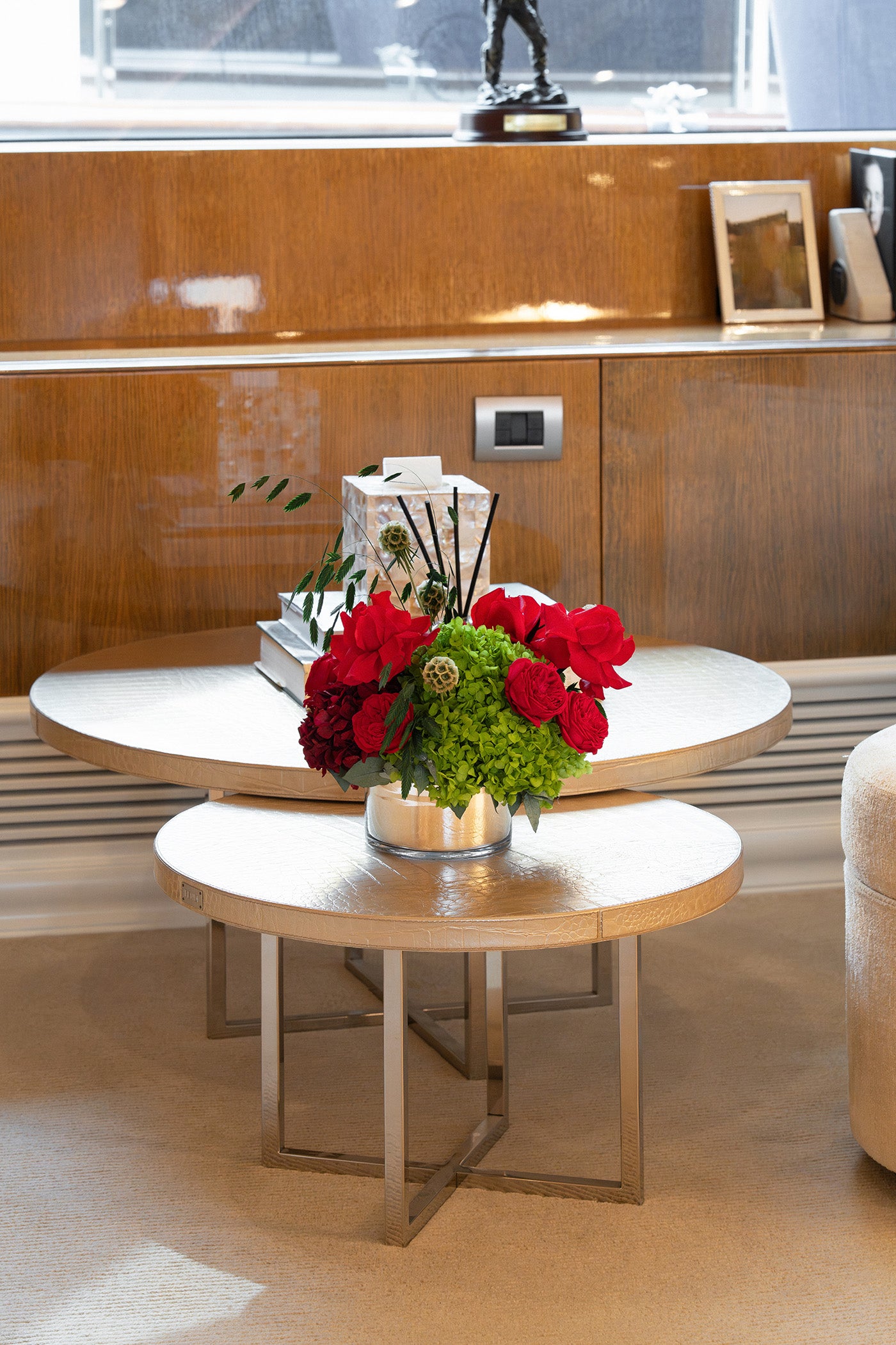 Long lasting tropical preserved arrangement with preserved roses and hydrangeas in a vase on board a yacht