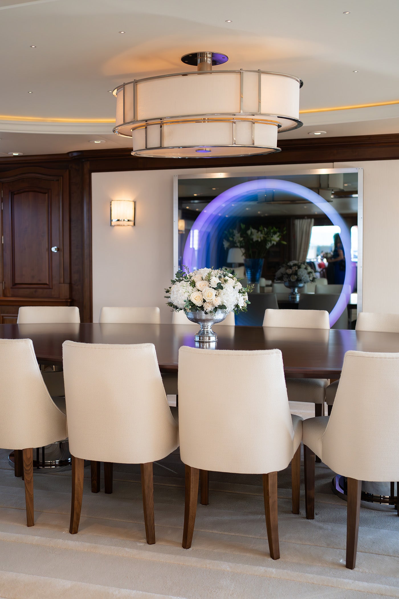 Preserved white mixed flower arrangement in main salon 