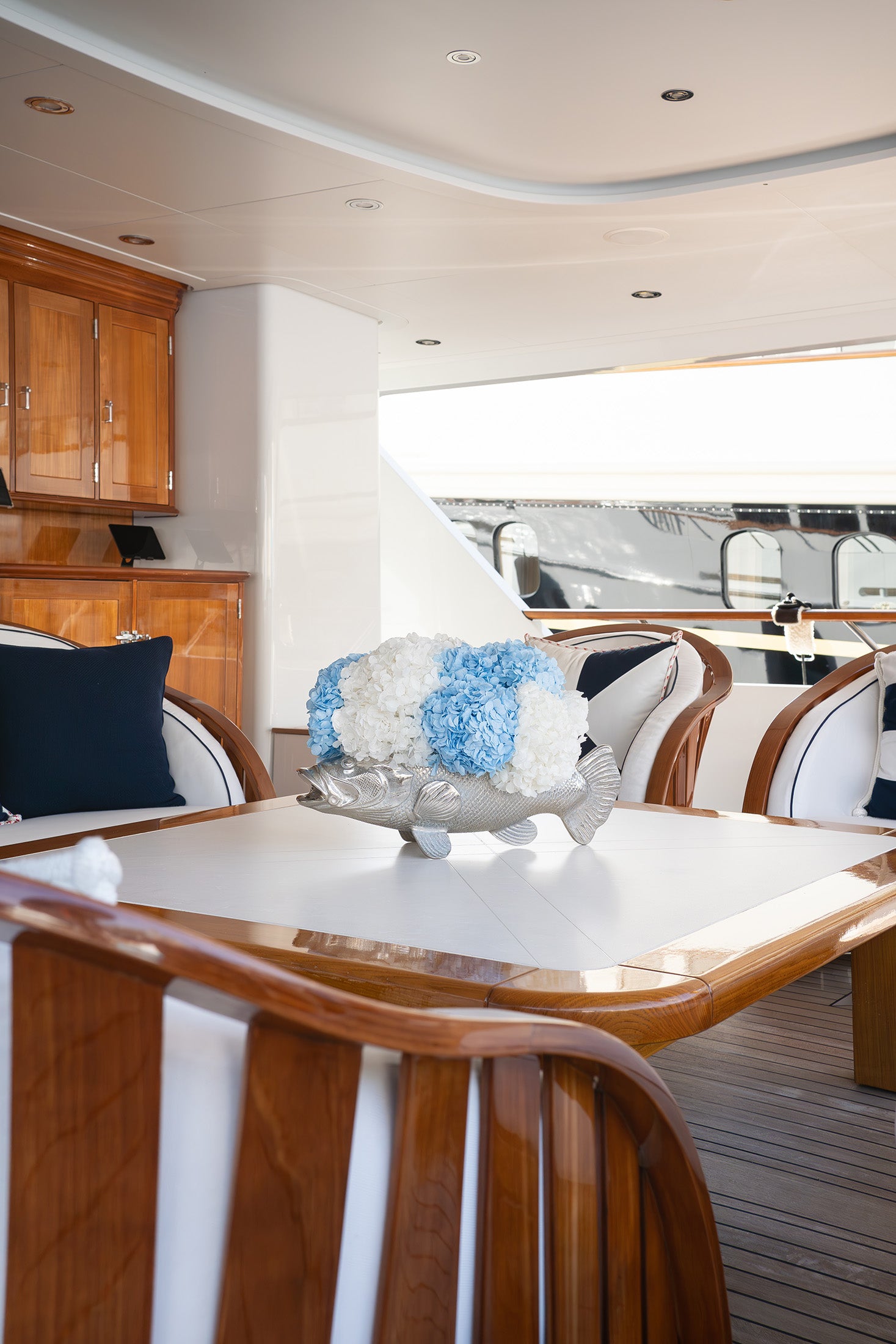 Preserved hydrangea flower arrangement on aft deck