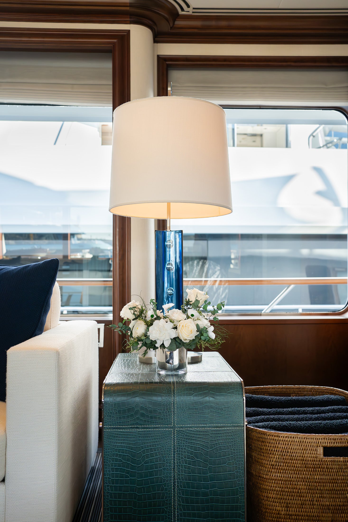 Preserved white mixed garden arrangement on side table