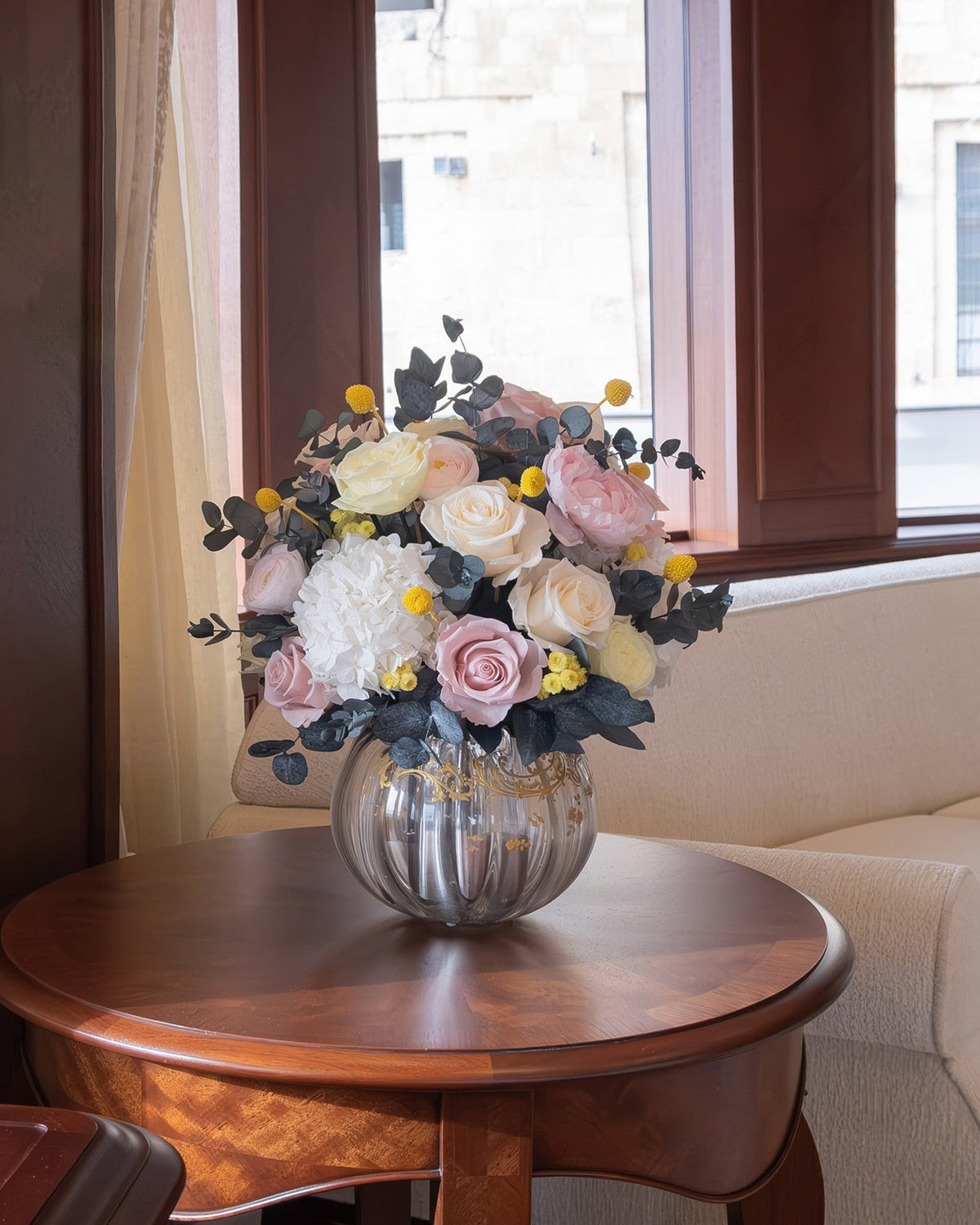 Preserved roses and hydrangeas arrangement on a yacht