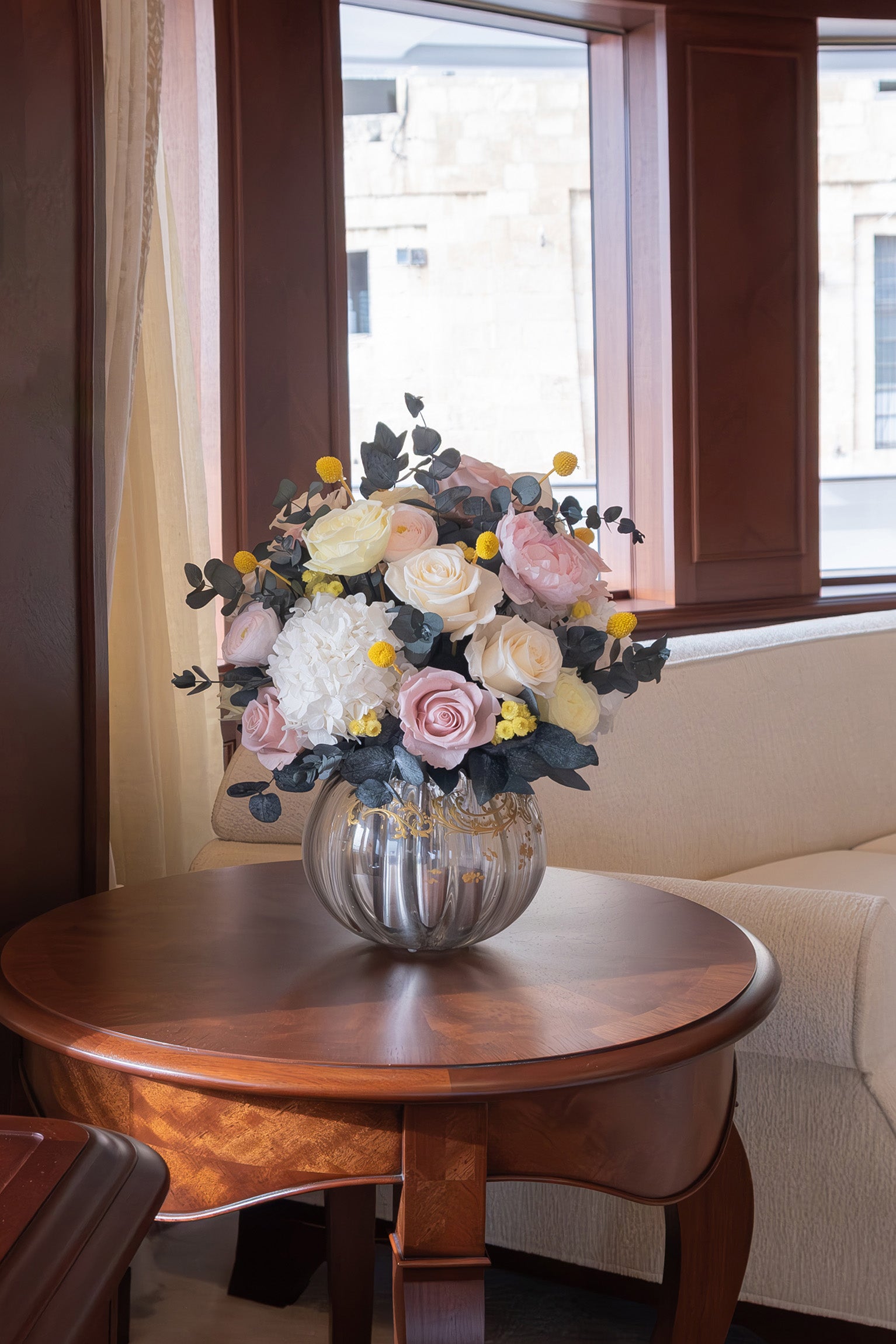 Preserved roses and hydrangeas arrangement on a yacht