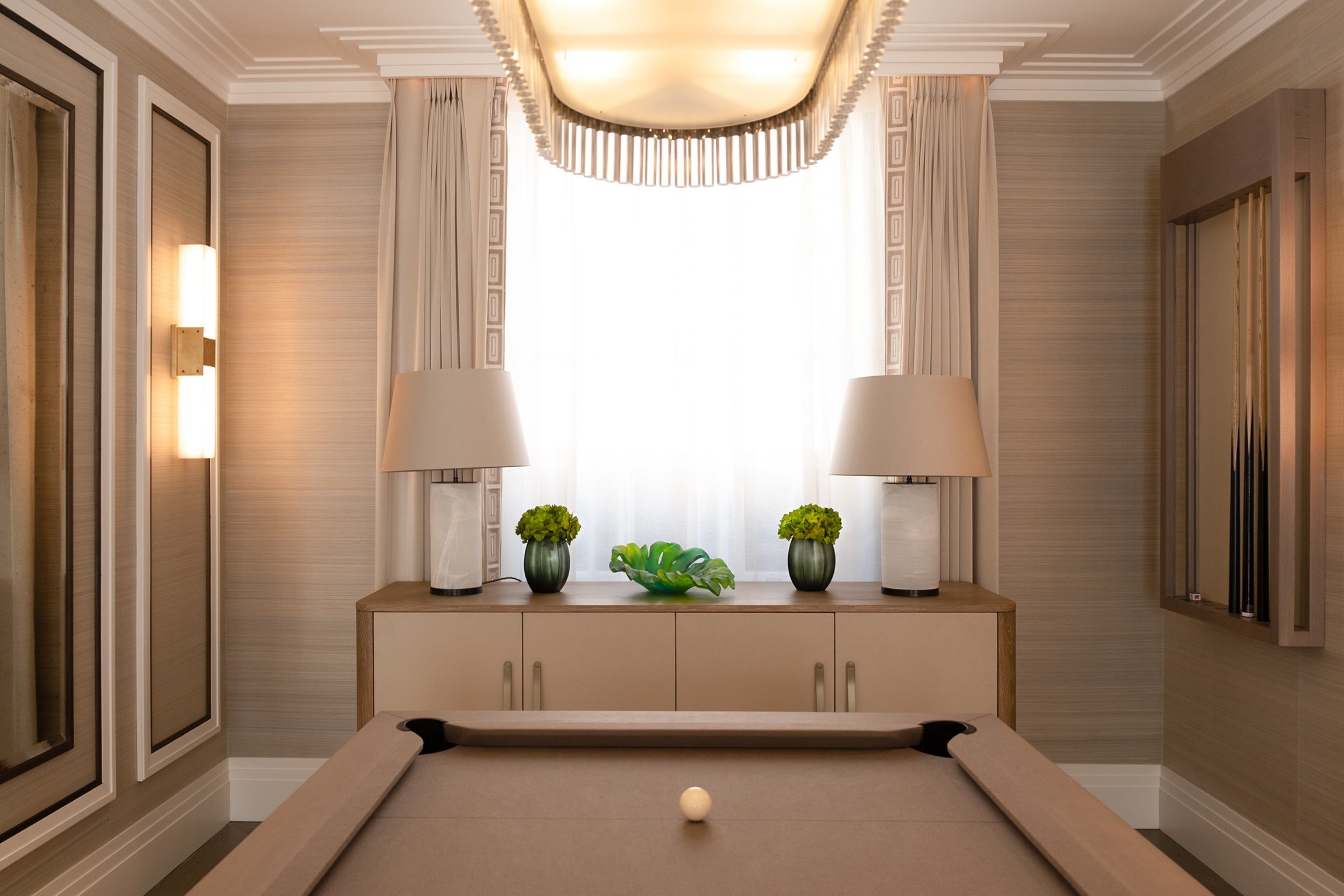 Preserved hydrangea arrangements in decorative vases