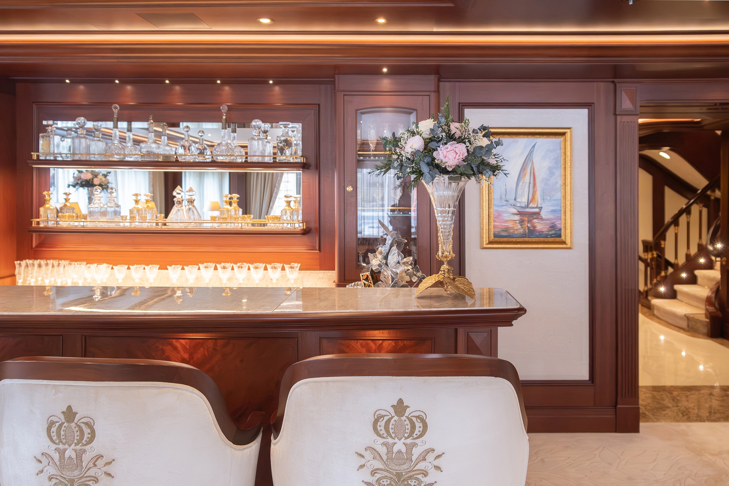 Preserved wild peony, ranunculus and rose with eucalyptus arrangement in main salon