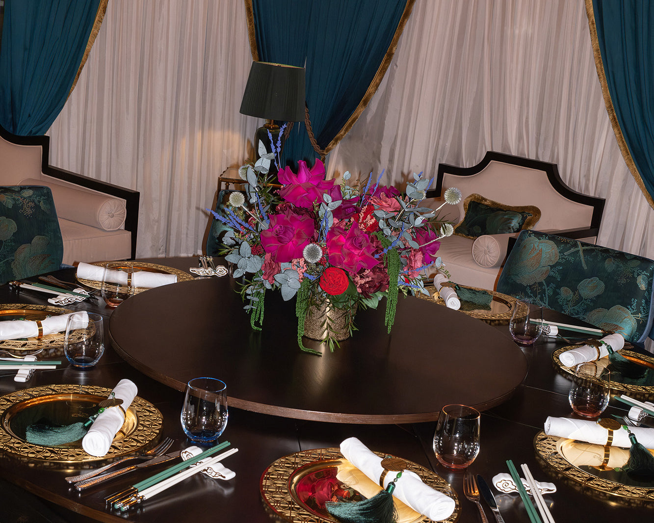 Preserved reflexed roses with eucalyptus arrangement in a vip dining room
