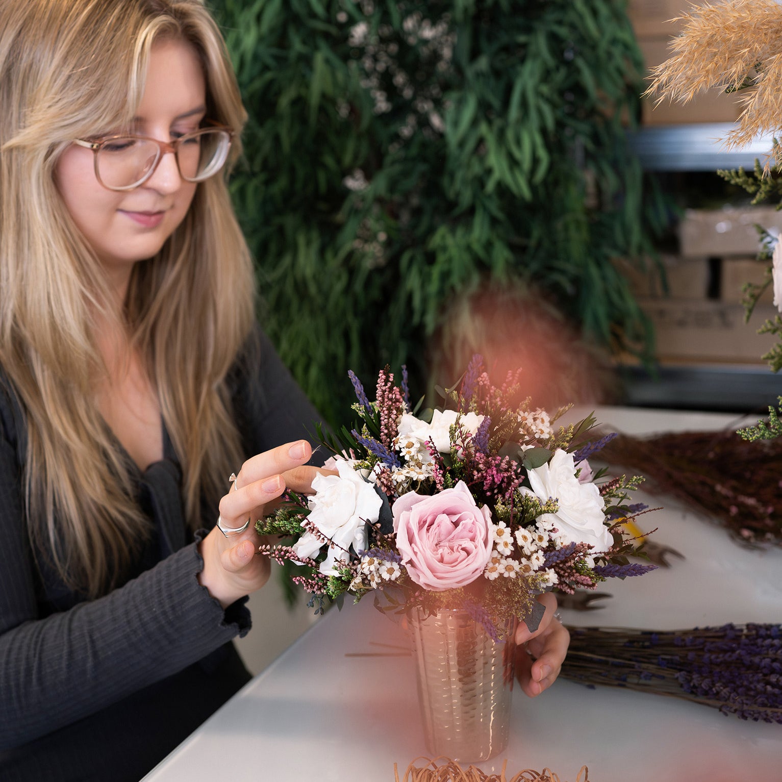Preserved flower arrangement being made in the London studio