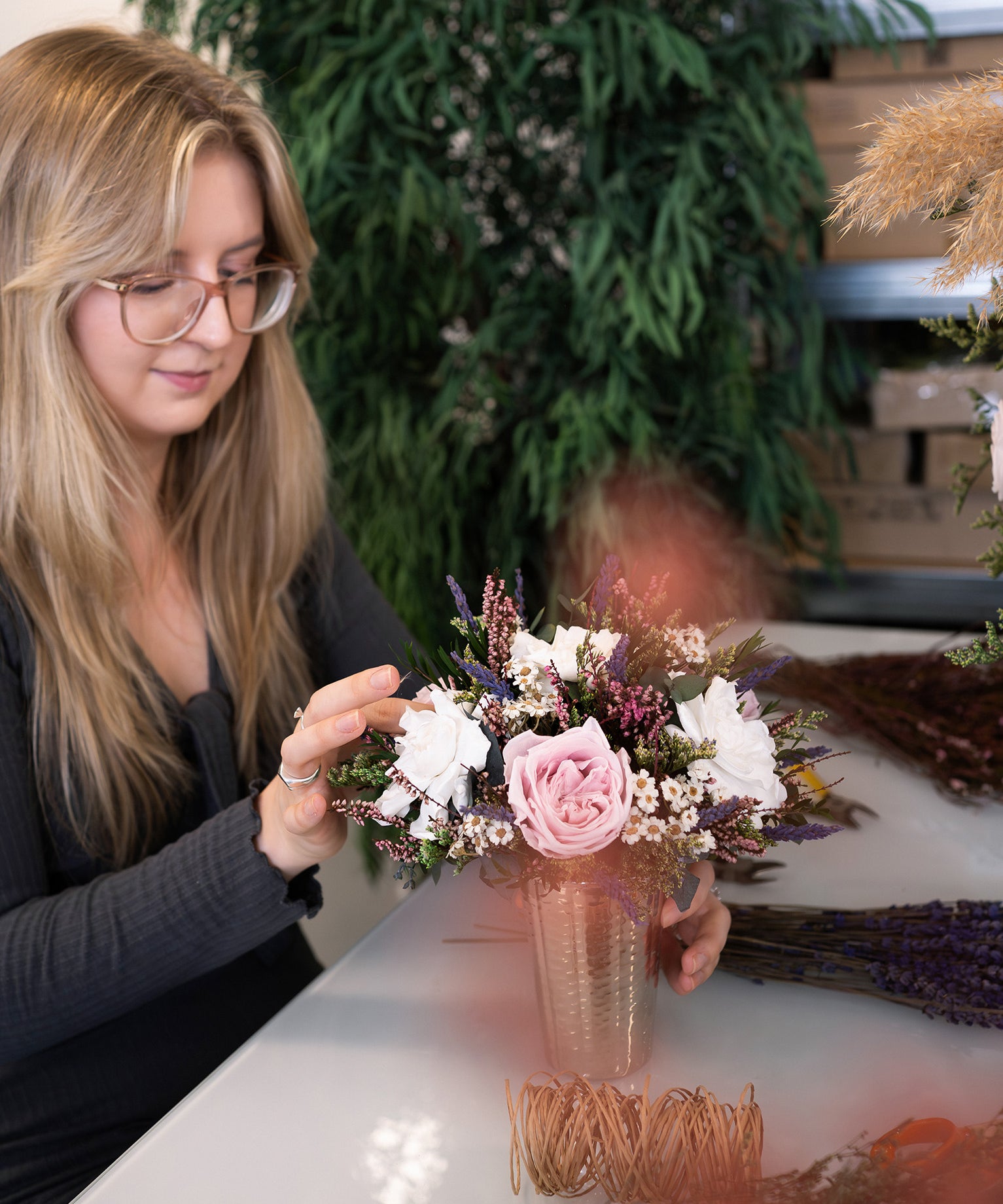 Preserved flower arrangement being made in the London studio