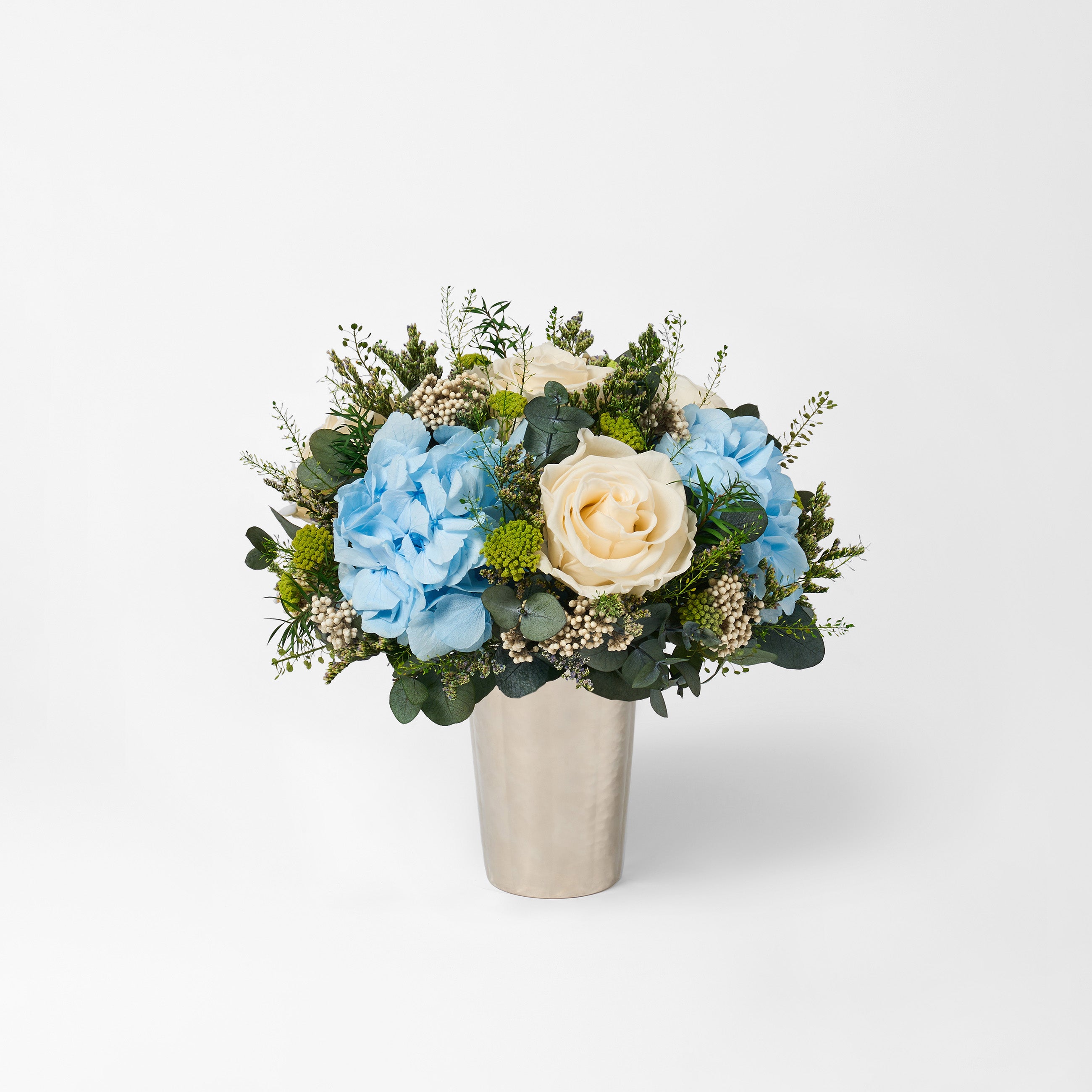 PRESERVED WHITE AND BLUE MIXED FLOWER ARRANGEMENT IN SILVER METAL VASE