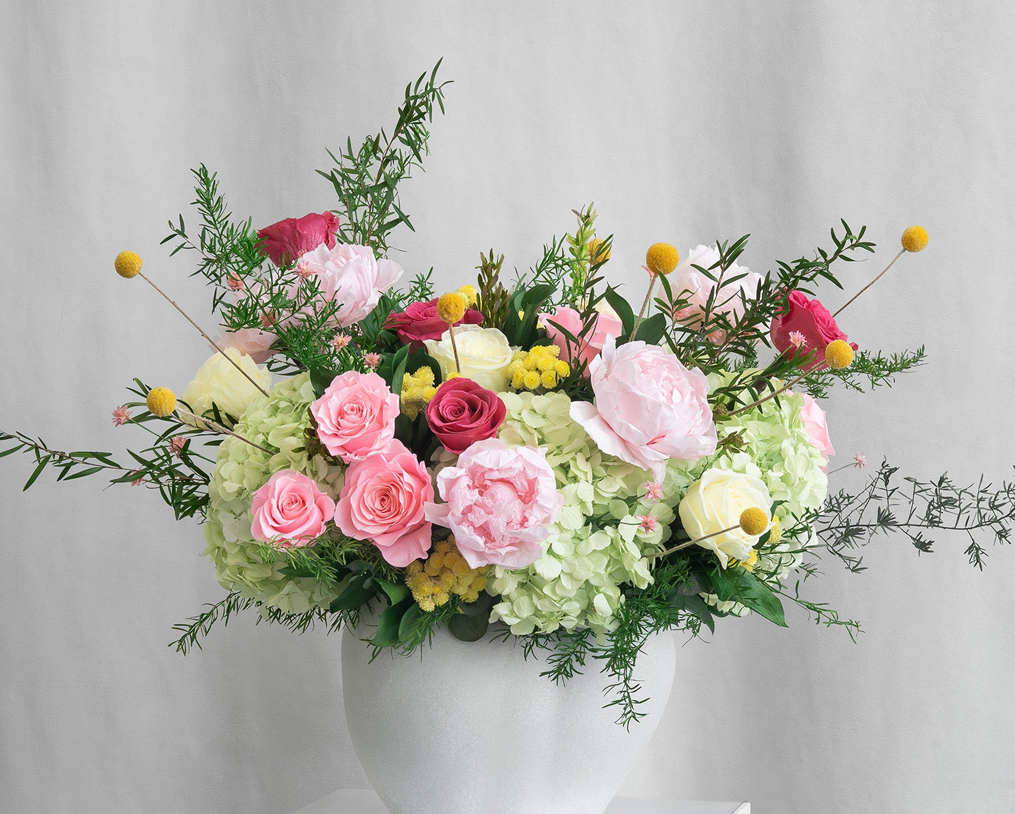 Preserved rose, peony and hydrangea arrangement with filler flower 
