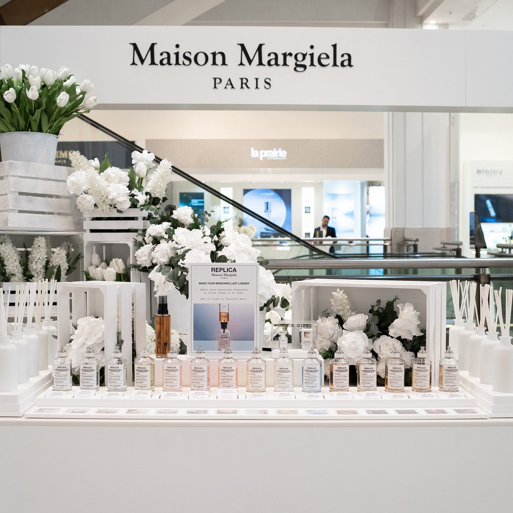 Preserved white mixed flowers installation for perfume launch