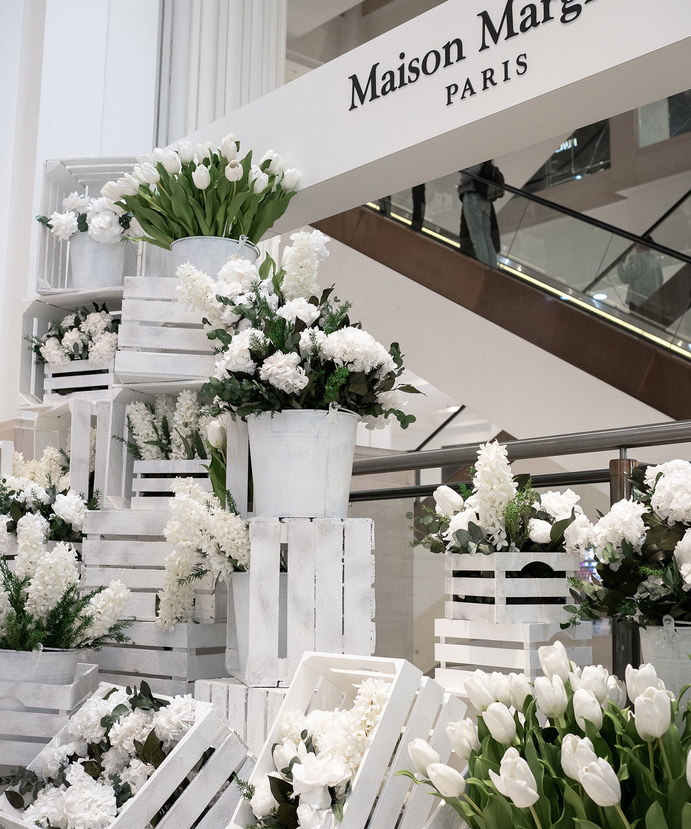 Preserved white mixed flowers installation for perfume launch