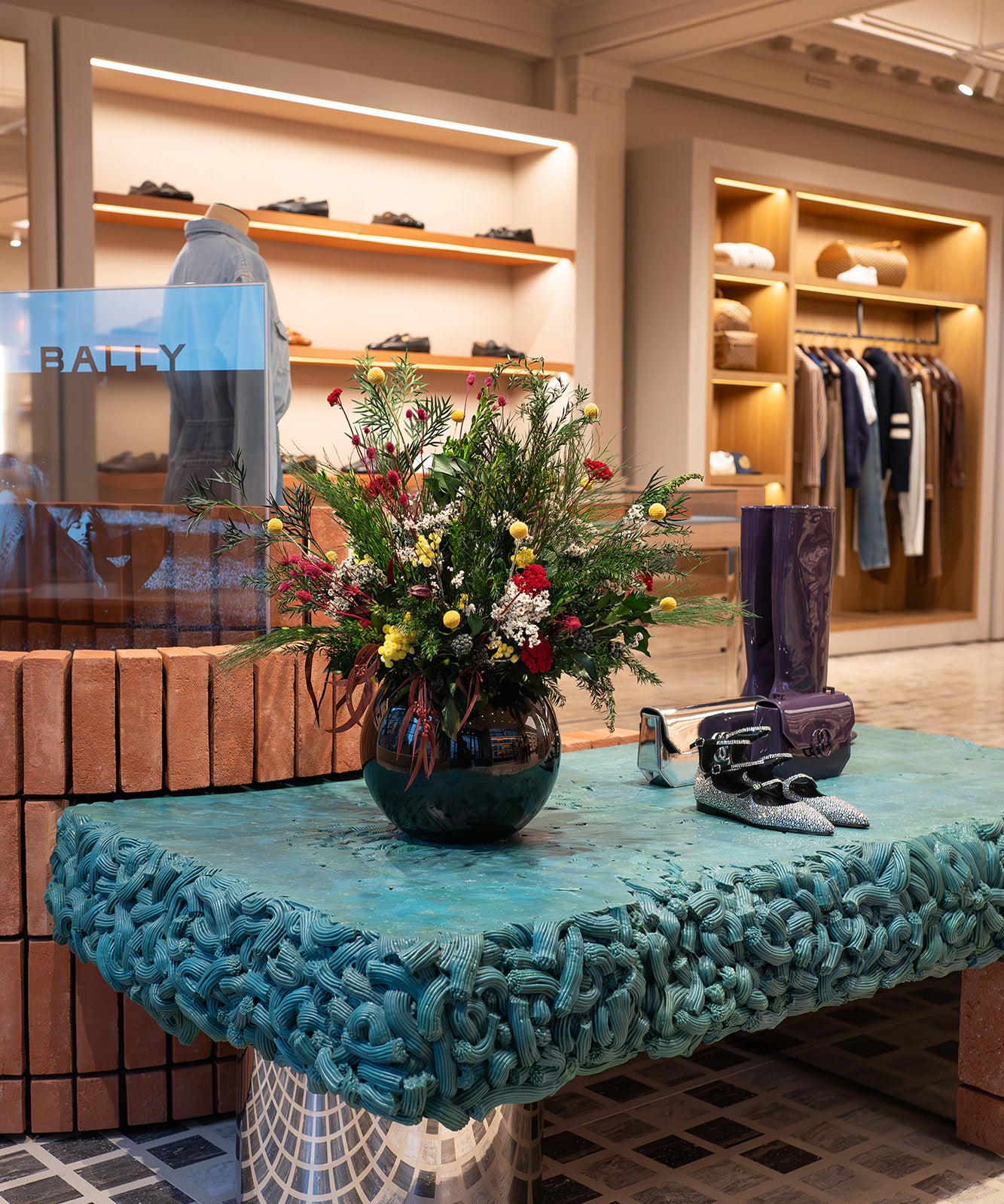 Preserved mixed wild flower arrangement displayed in a luxury store