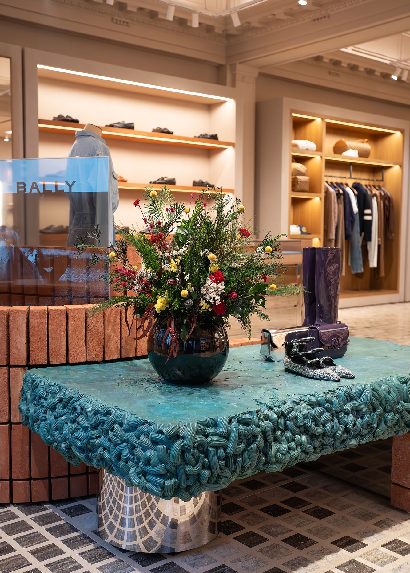 Preserved mixed wild flower arrangement displayed in a luxury store