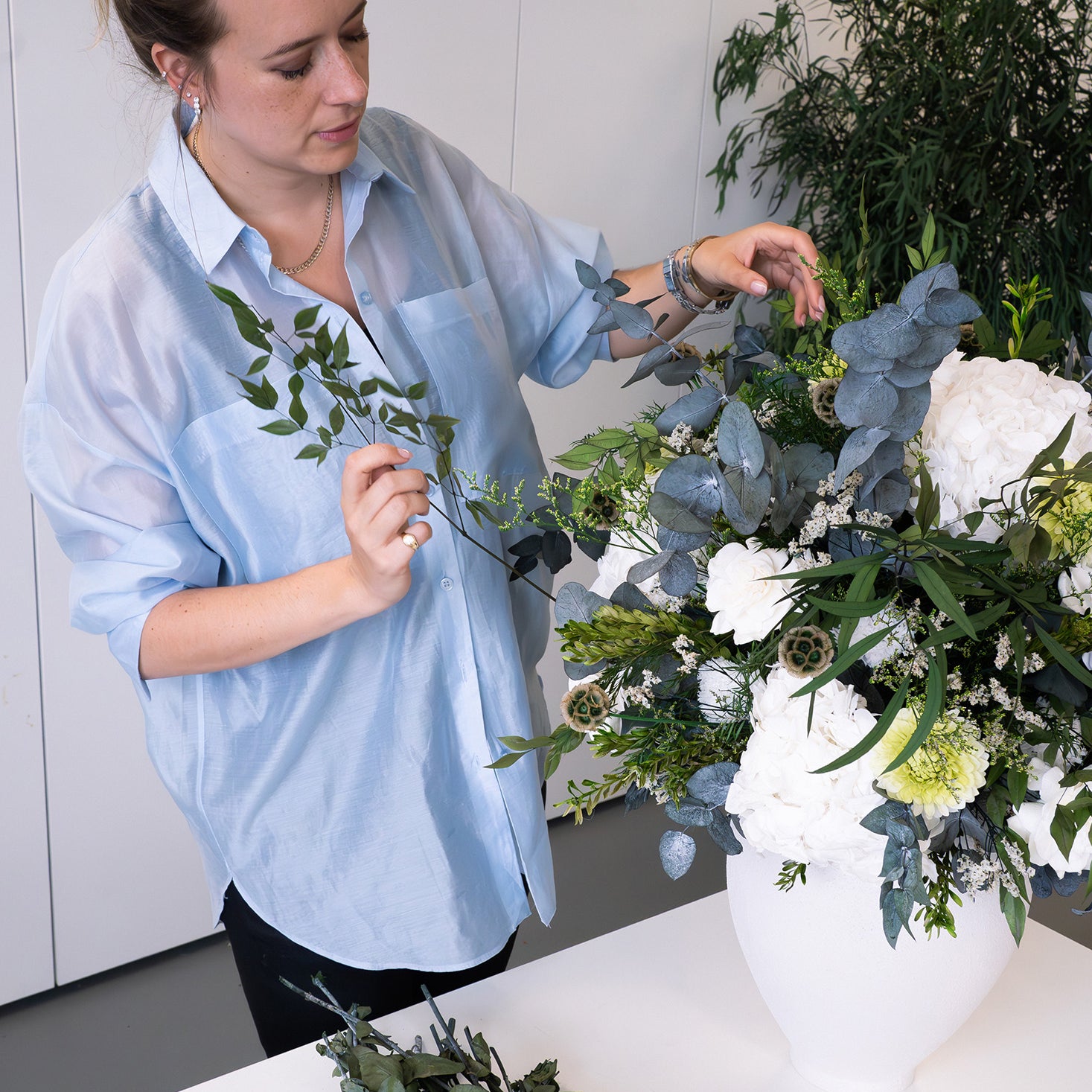 Preserved flower arrangement being made in the London studio