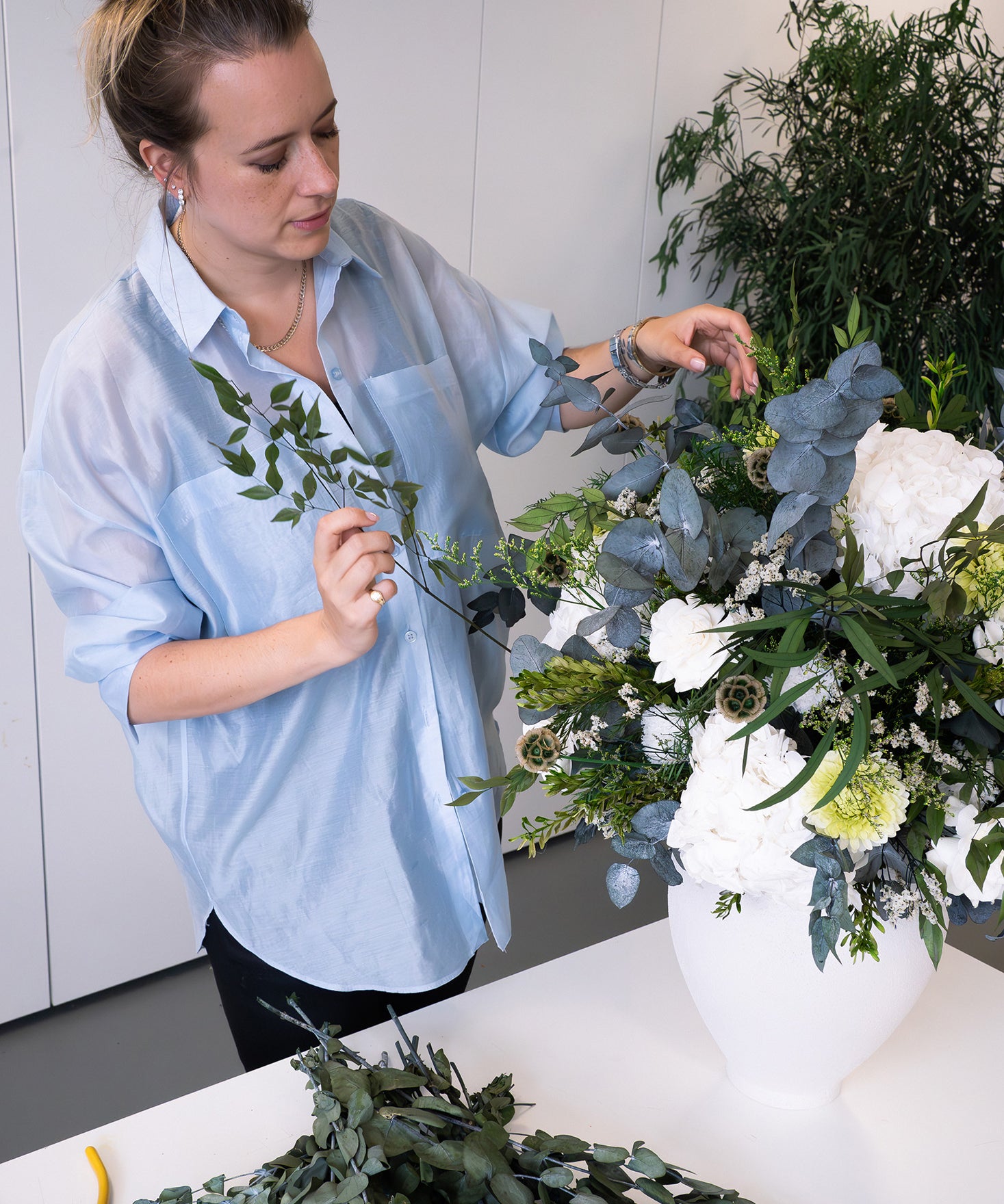 Preserved flower arrangement being made in the London studio