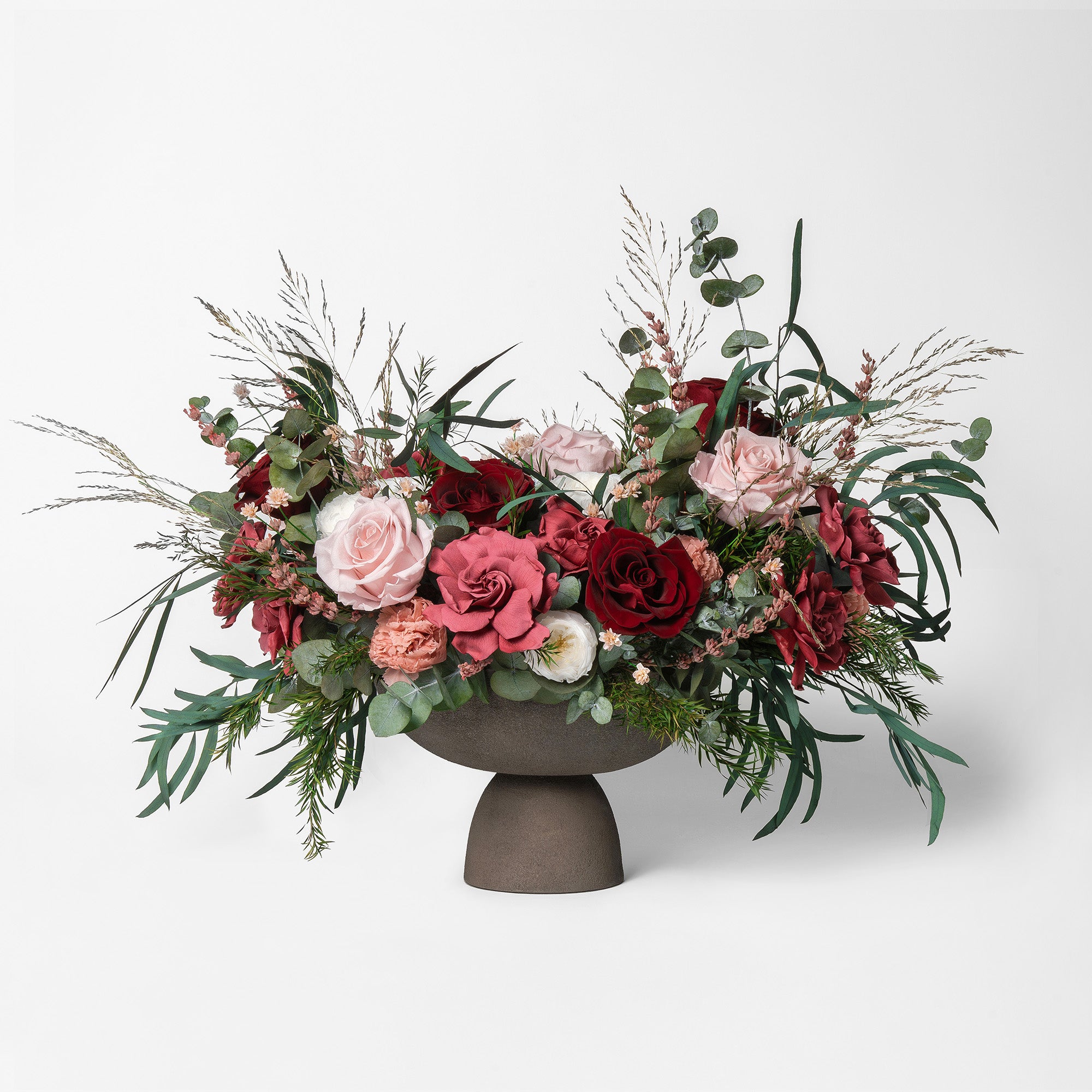 PRESERVED BURGUNDY & CHERRY MIXED FLOWER ARRANGEMENT IN GREY FOOTED VASE