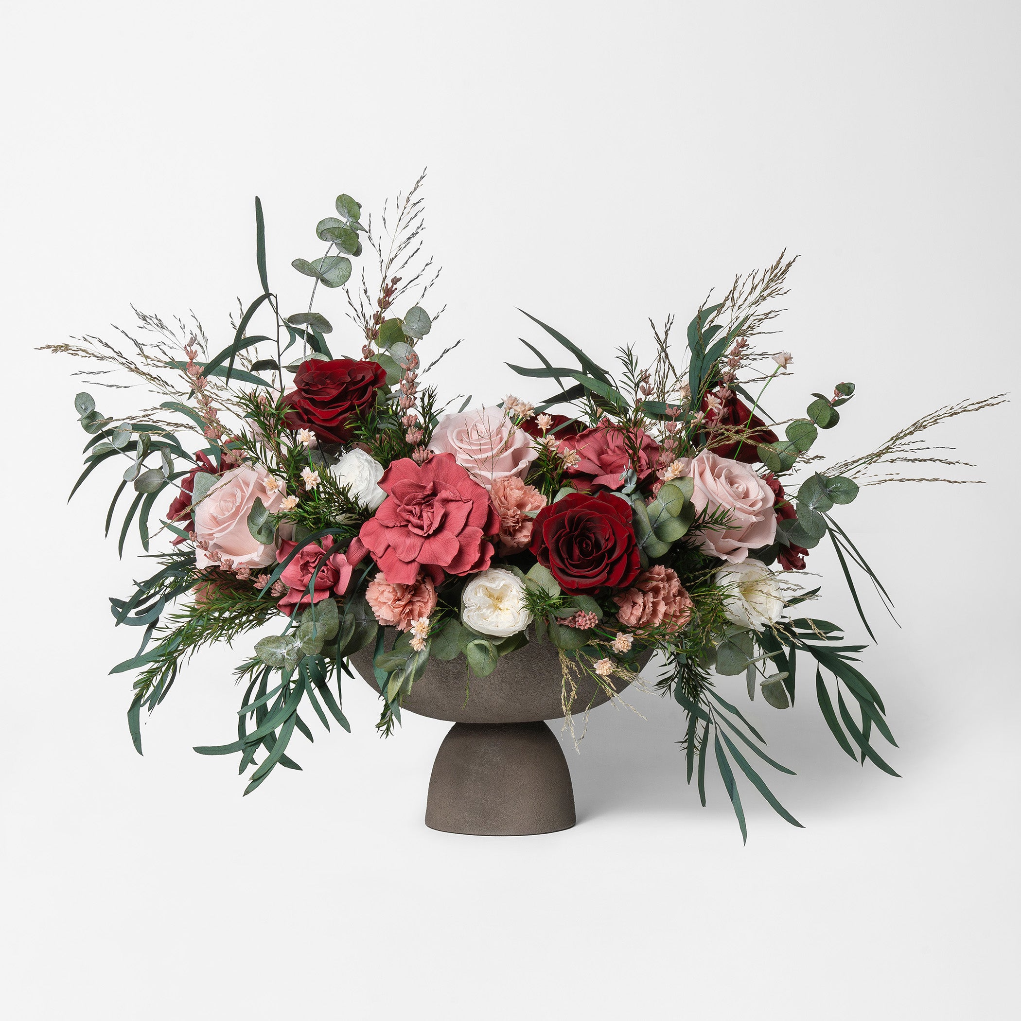 PRESERVED BURGUNDY & CHERRY MIXED FLOWER ARRANGEMENT IN GREY FOOTED VASE