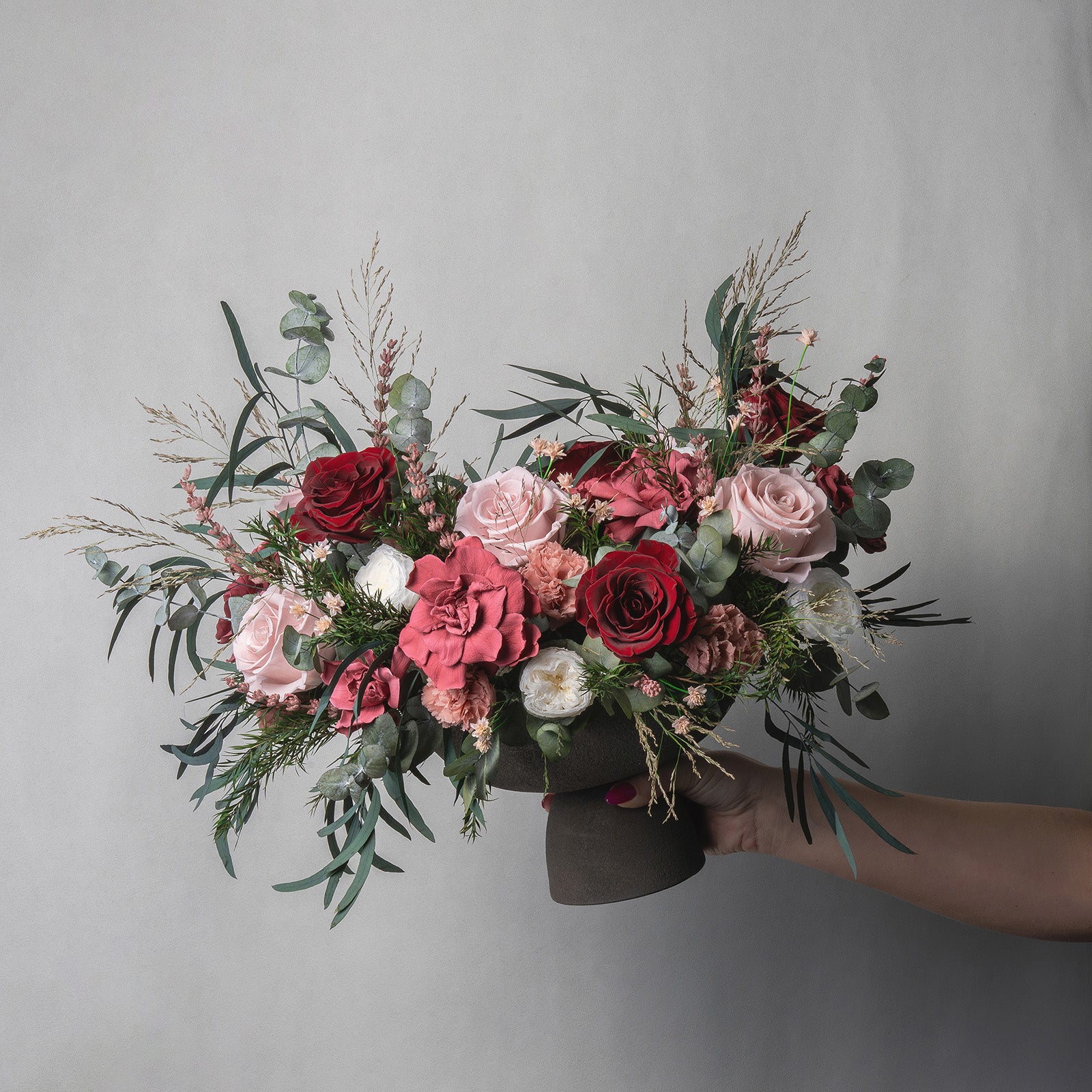 PRESERVED BURGUNDY & CHERRY MIXED FLOWER ARRANGEMENT IN GREY FOOTED VASE