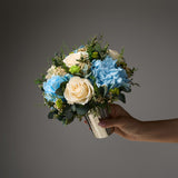 PRESERVED WHITE AND BLUE MIXED FLOWER ARRANGEMENT IN SILVER METAL VASE