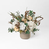 PRESERVED WHITE AND PEACH WILD MIXED FLOWER ARRANGEMENT IN STONE VASE
