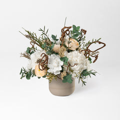 PRESERVED WHITE AND PEACH WILD MIXED FLOWER ARRANGEMENT IN STONE VASE