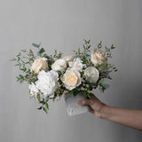 PRESERVED WHITE MIXED FLOWER ARRANGEMENT IN MARBLE VASE