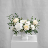 PRESERVED WHITE MIXED FLOWER ARRANGEMENT IN MARBLE VASE
